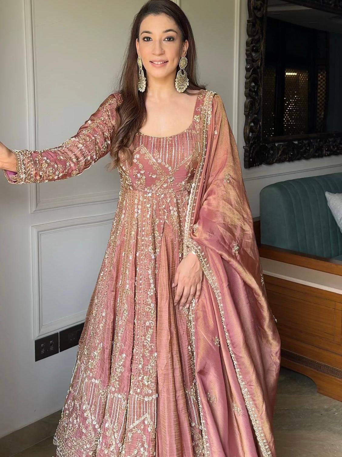 Glamorous Grace: Festive Attire Unveiled