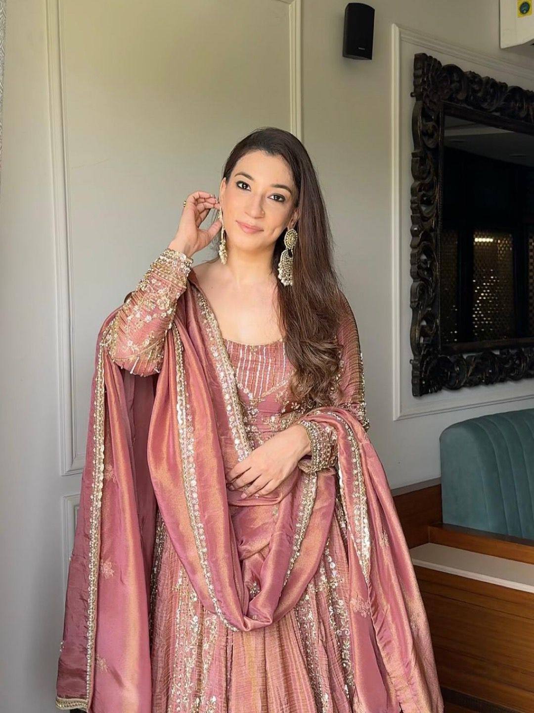 Glamorous Grace: Festive Attire Unveiled