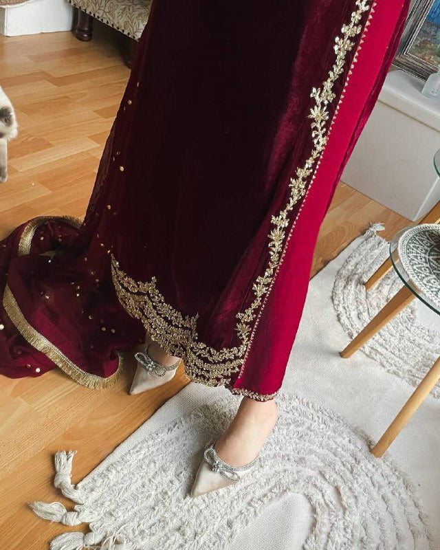 Majestic Maroon Attire with Golden Accents