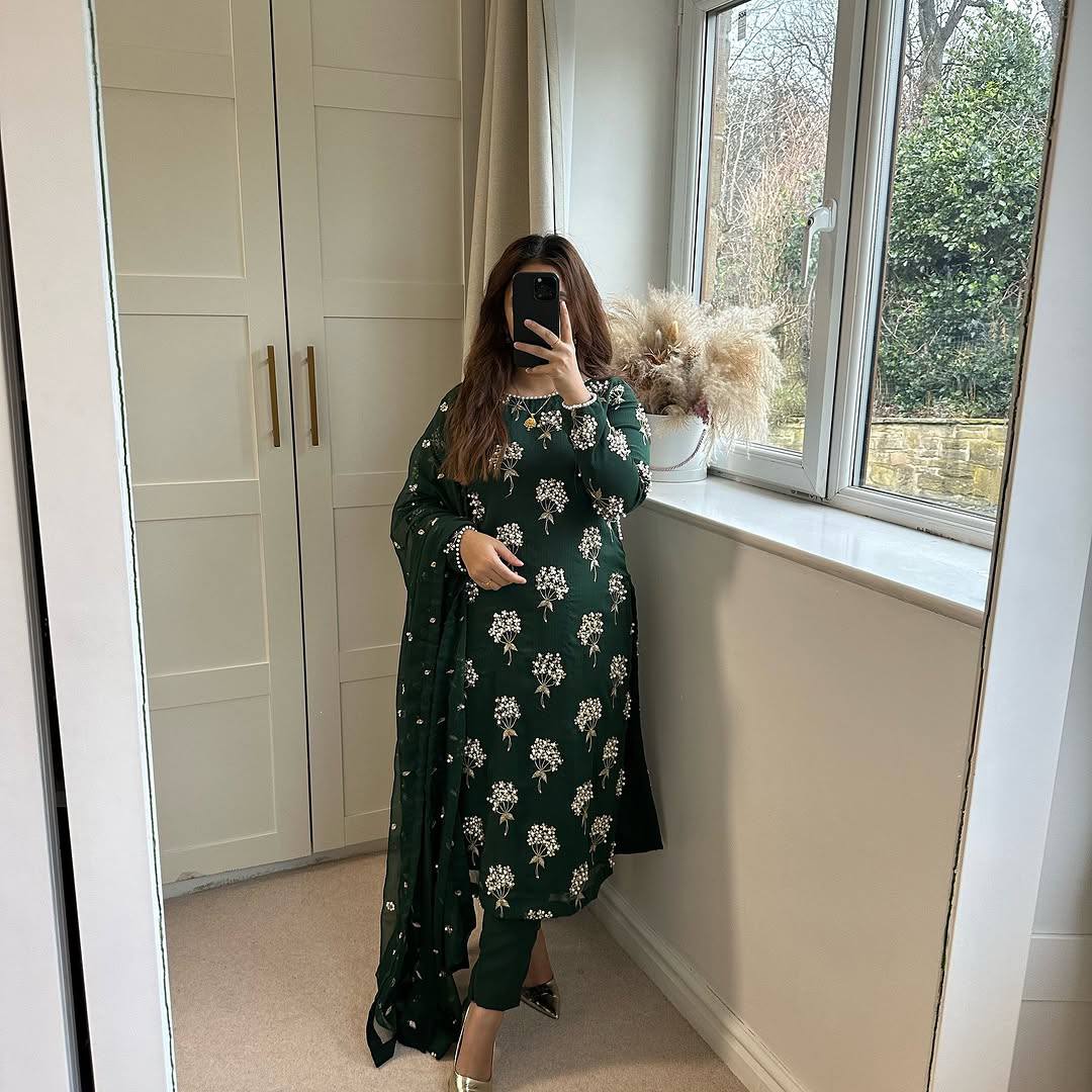 Elegance in Emerald Floral Attire