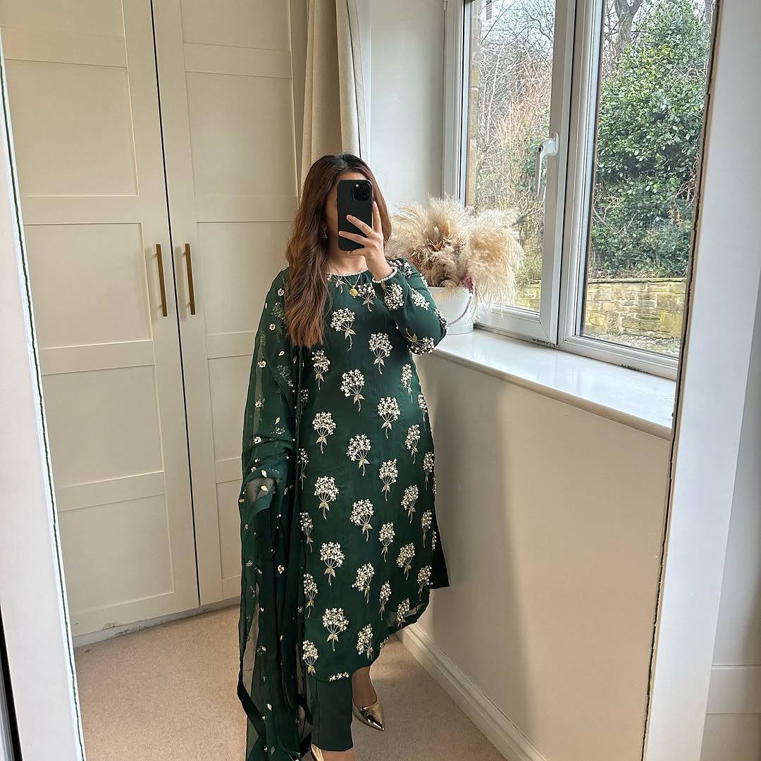 Elegance in Emerald Floral Attire