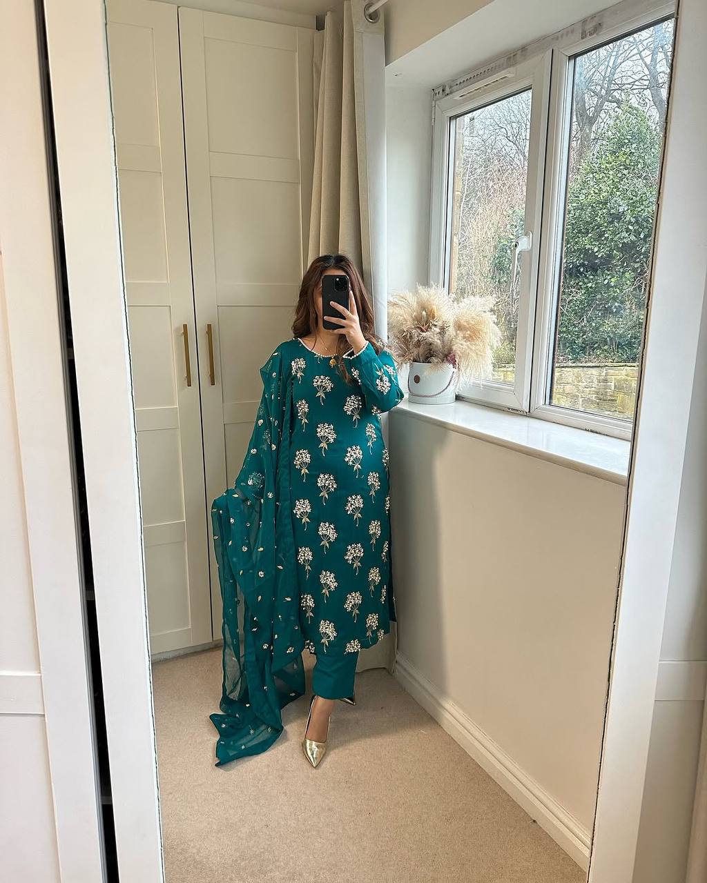 Elegance in Emerald Floral Attire