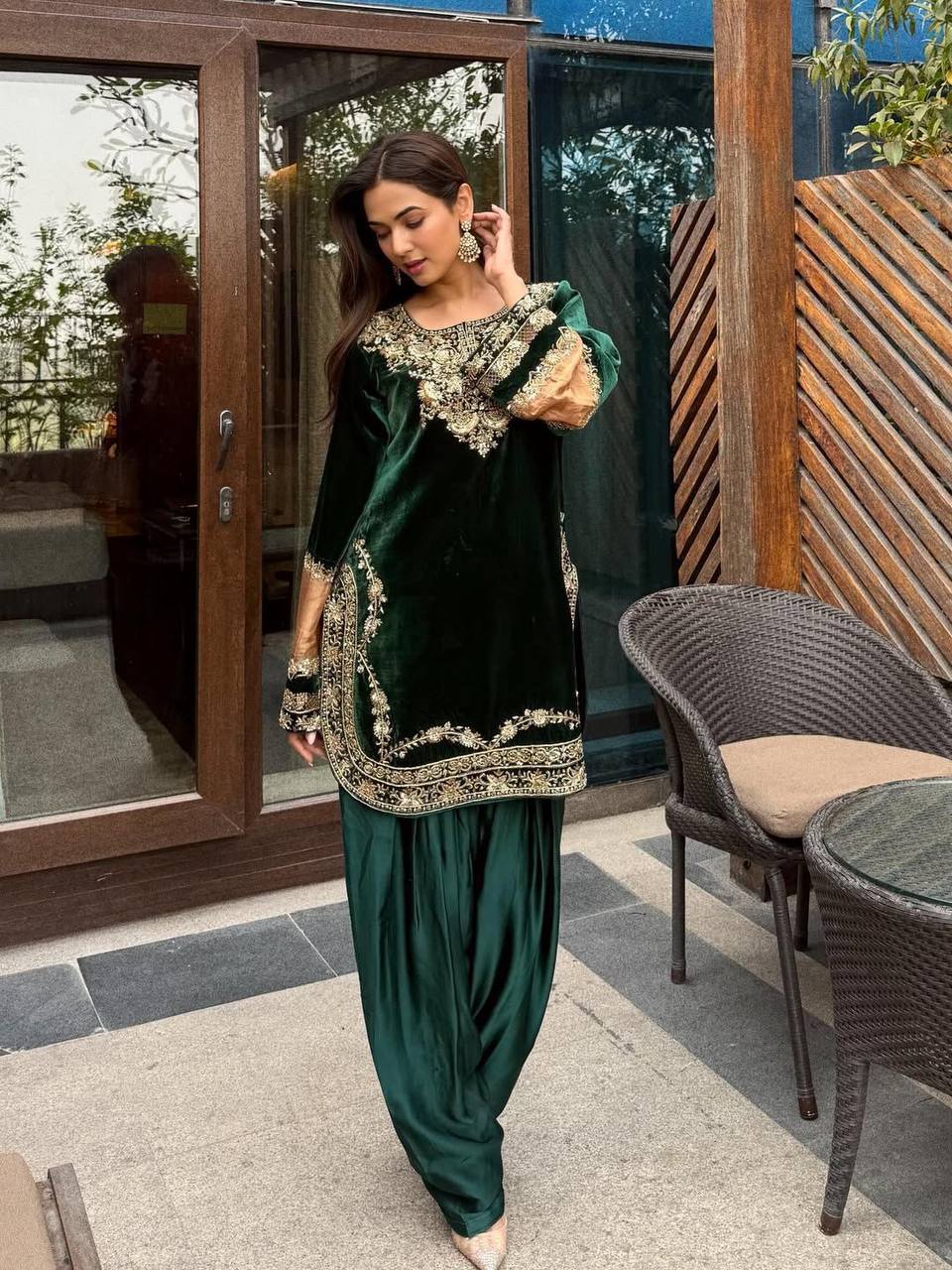 Regal Green Attire with Golden Accents