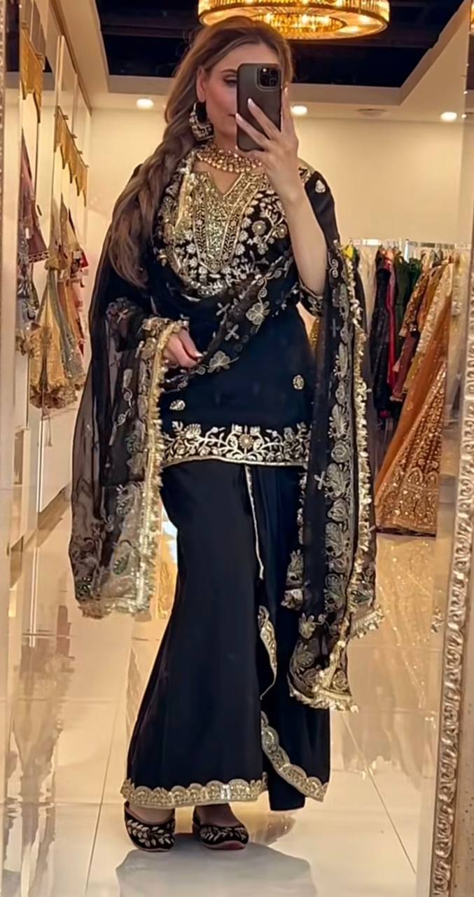 Elegance in Black and Gold Attire