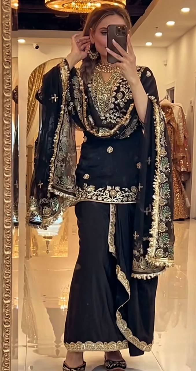 Elegance in Black and Gold Attire