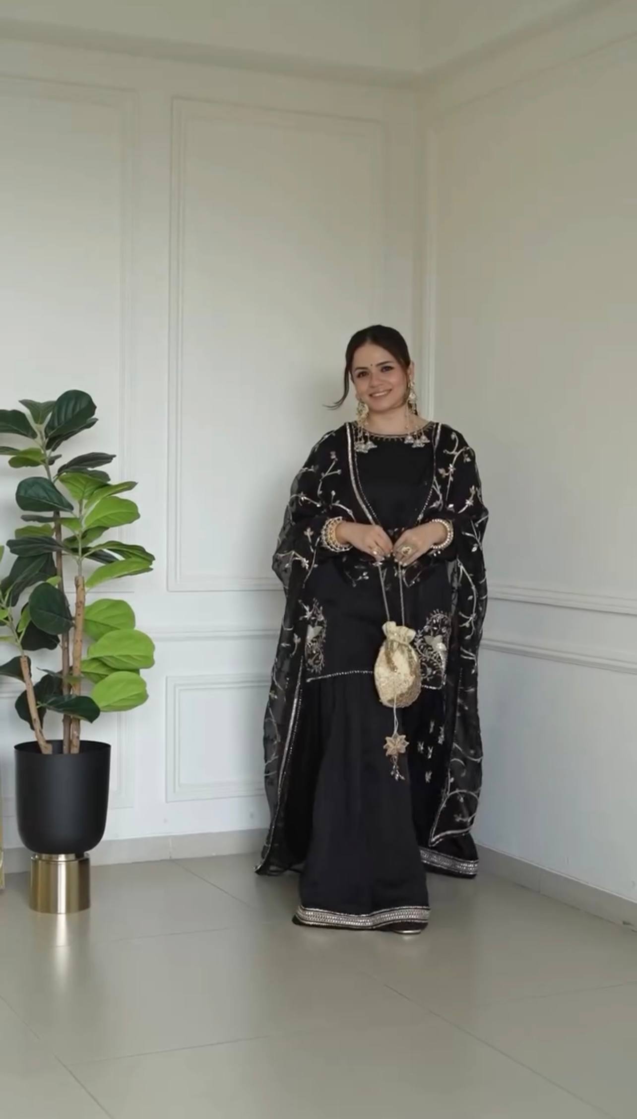 Glamorous Black Outfit for Festive Celebrations