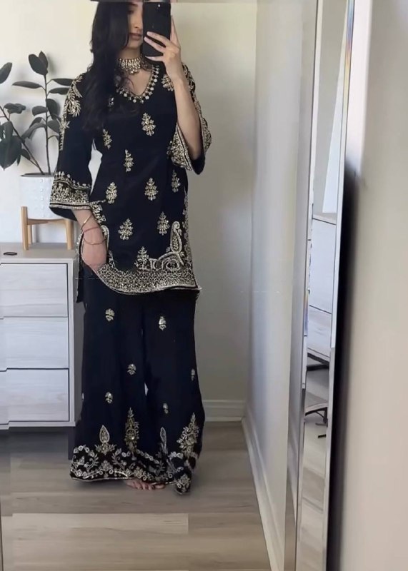 Regal Attire: Black and Gold Splendor