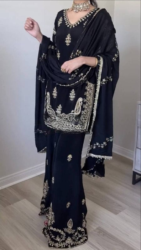 Regal Attire: Black and Gold Splendor