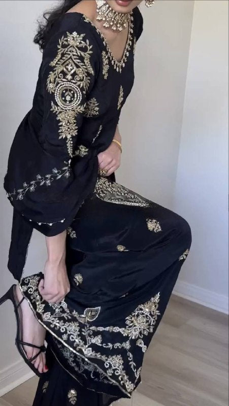 Regal Attire: Black and Gold Splendor