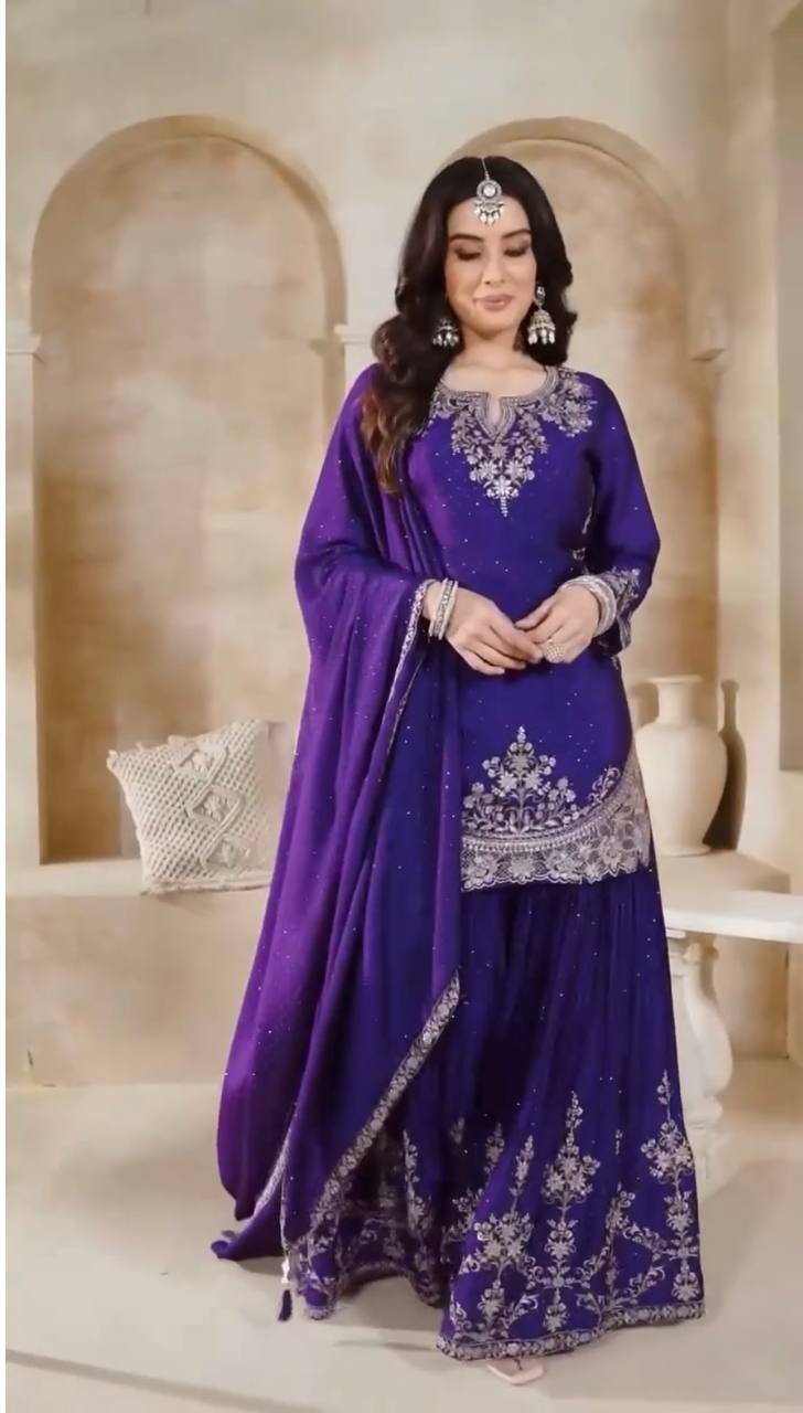 Royal Radiance A Majestic Purple Ensemble Embellished with Silver Elegance