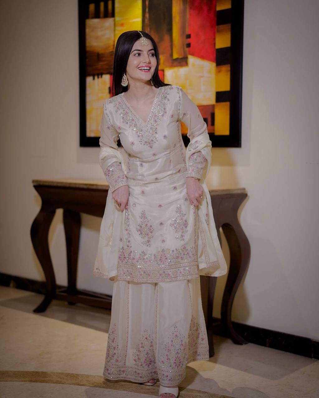Timeless Beauty Woman in White Dress Posing Gracefully