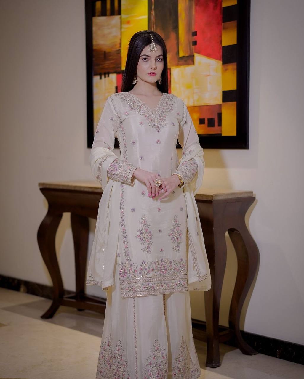 Timeless Beauty Woman in White Dress Posing Gracefully