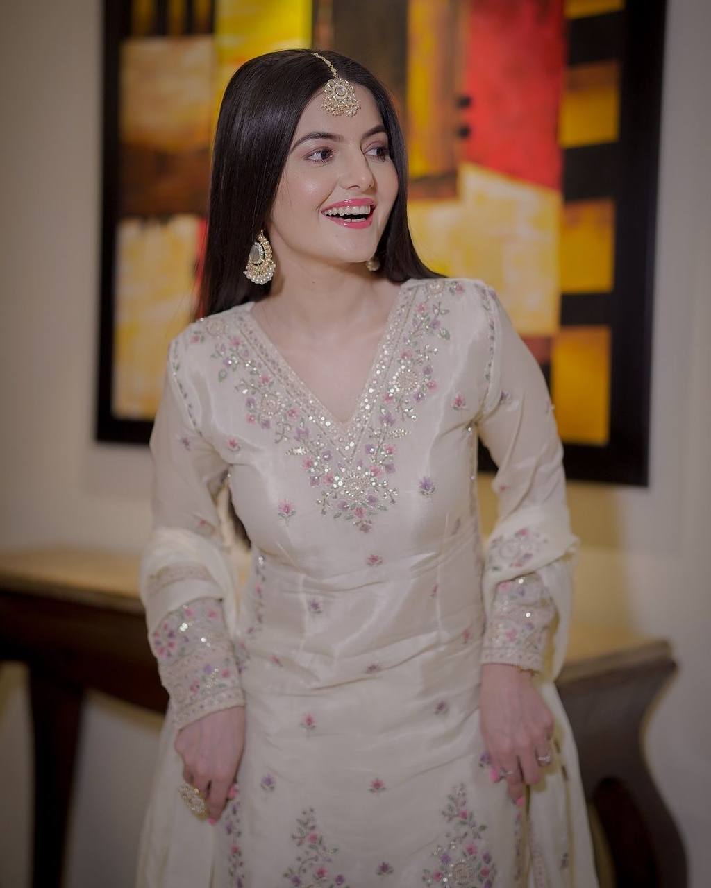 Timeless Beauty Woman in White Dress Posing Gracefully