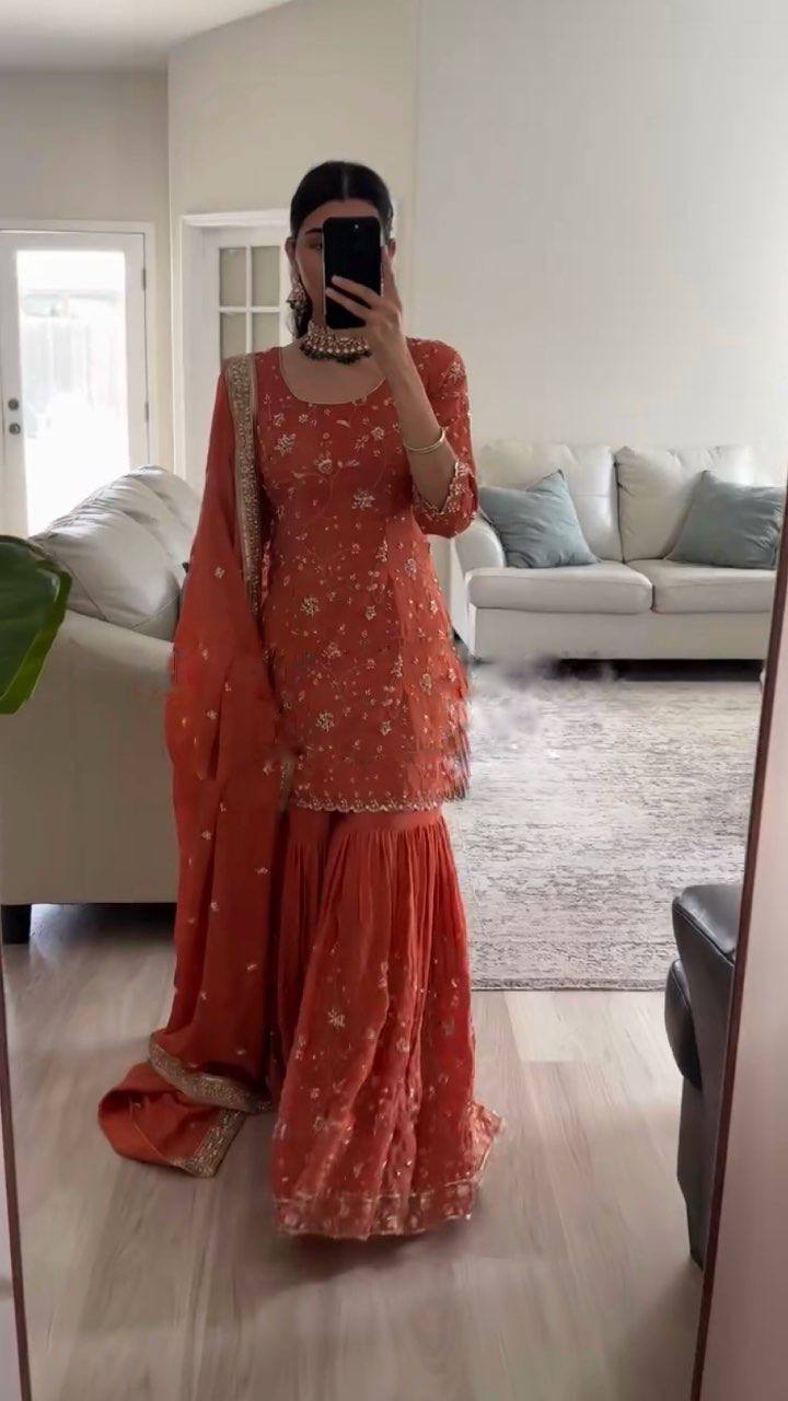 Graceful Orange Dress with Intricate Embroidery
