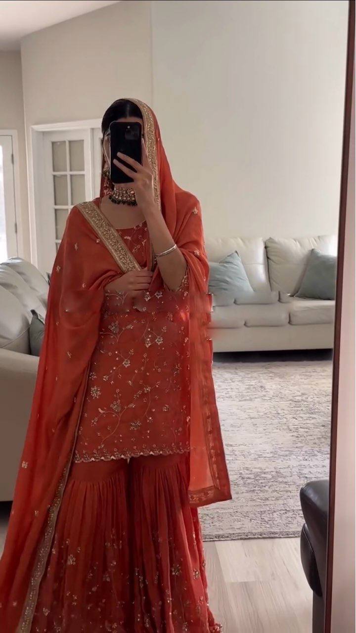 Graceful Orange Dress with Intricate Embroidery