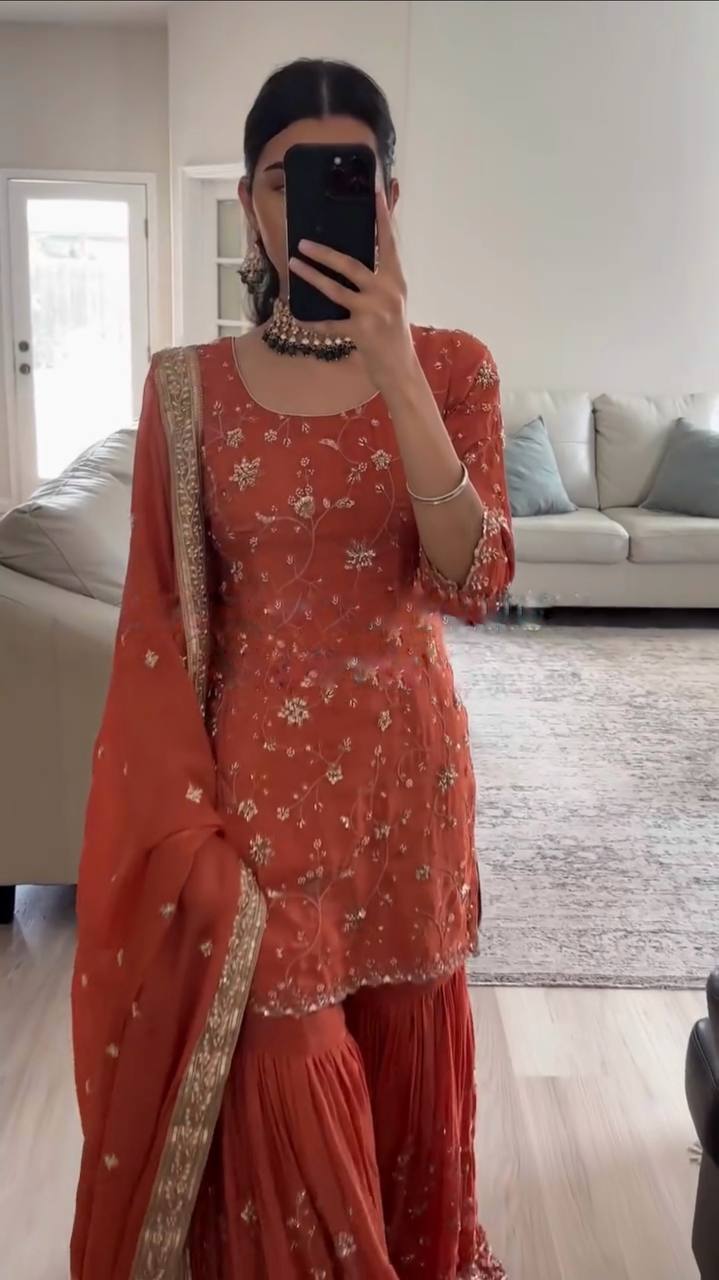 Graceful Orange Dress with Intricate Embroidery
