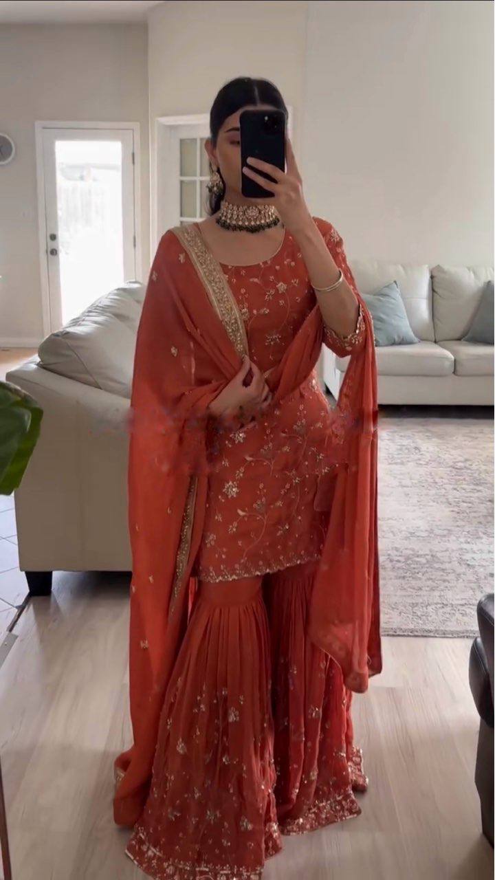 Graceful Orange Dress with Intricate Embroidery