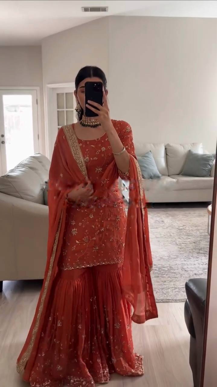 Graceful Orange Dress with Intricate Embroidery